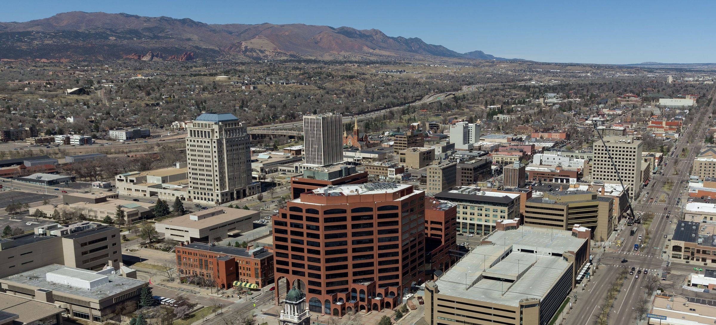 Downtown Colorado Springs skyline with Pikes Peak in the background